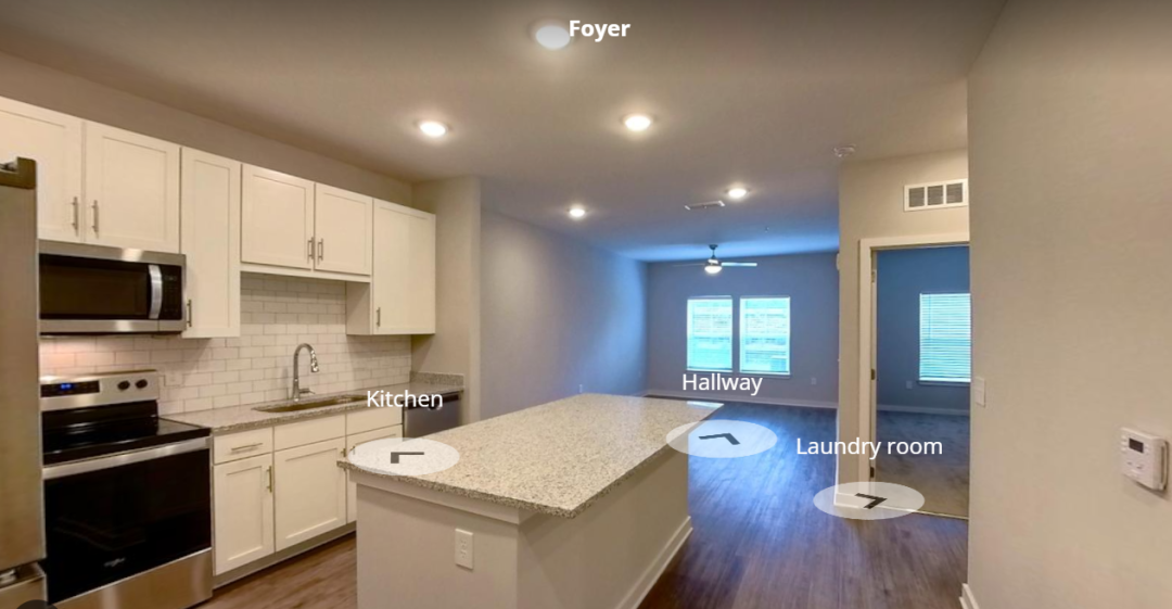 a virtual kitchen with a white counter and cabinets at The Story Mundy Mill